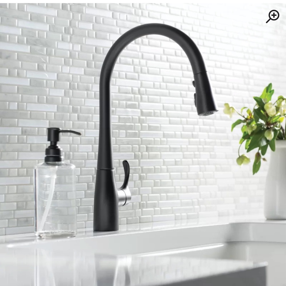 Brand new in box. I Changed to stainless steel. Very nice faucet!